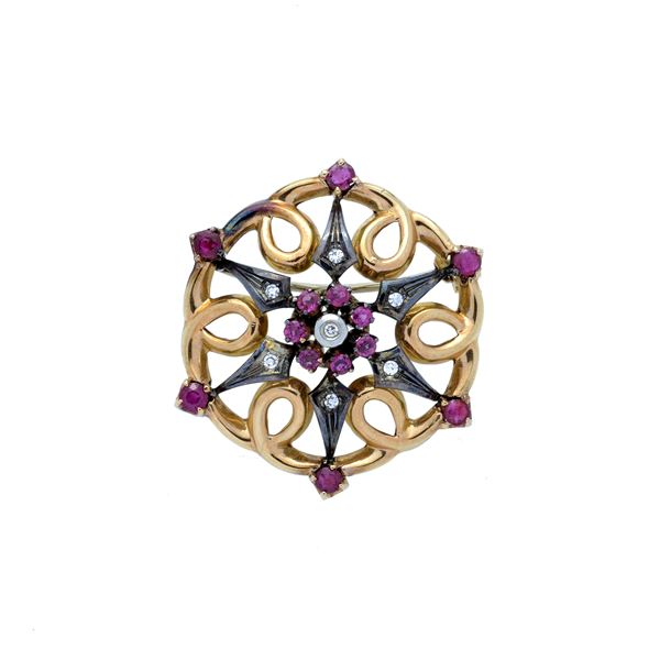 Floral brooch in yellow gold, white gold, diamonds and rubies