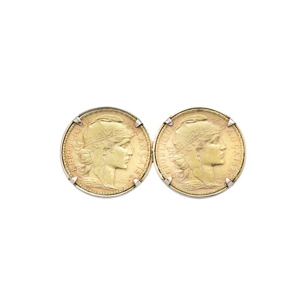 Spilla con due monete da 20 Franchi francesi in oro giallo