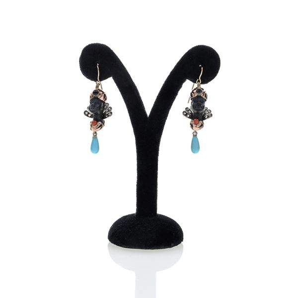 Pair of Moretto earrings in low title gold, ebony, silver, diamonds, coral and turquoise
