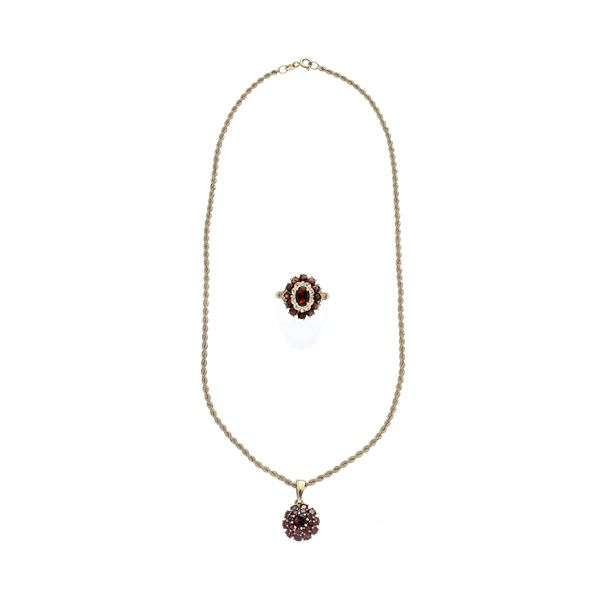 Parure in oro giallo 18 kt e granati