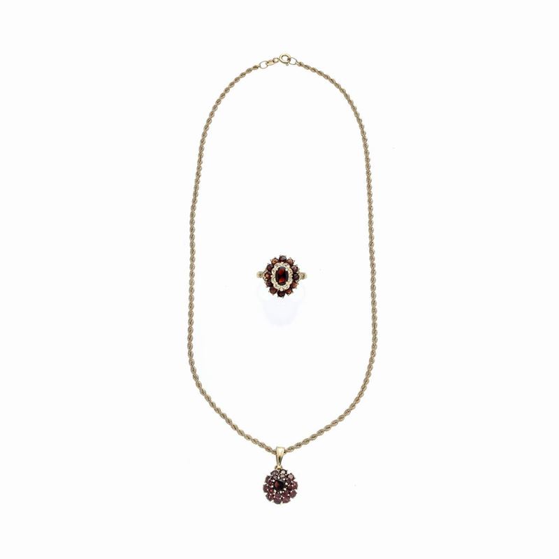 Parure in oro giallo 18 kt e granati