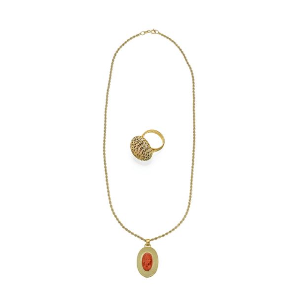 Necklace with coral cameo and yellow gold domed ring