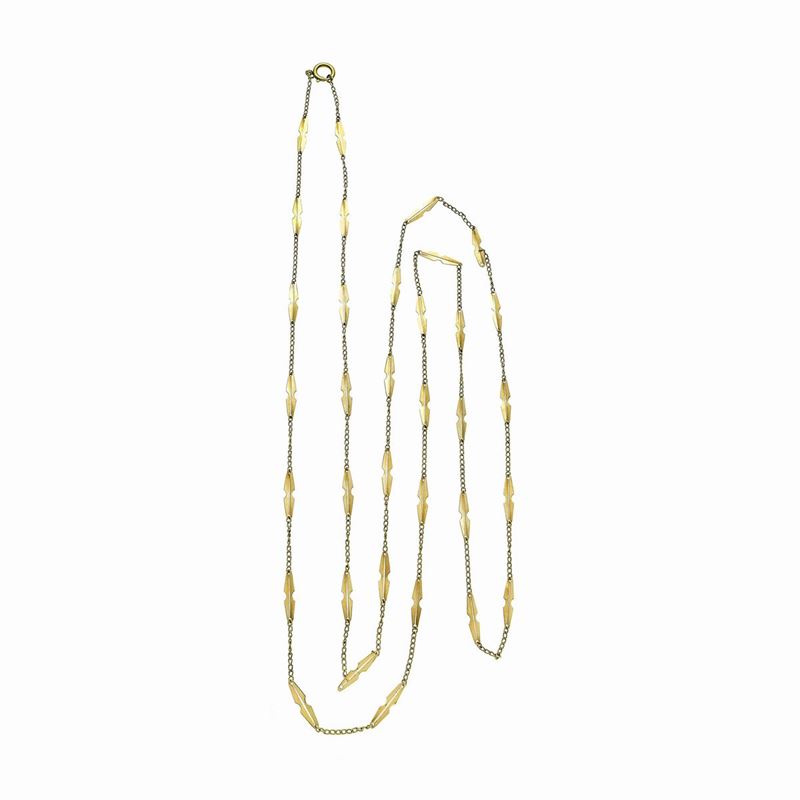 Lunga catena da orologio in oro giallo 18 kt