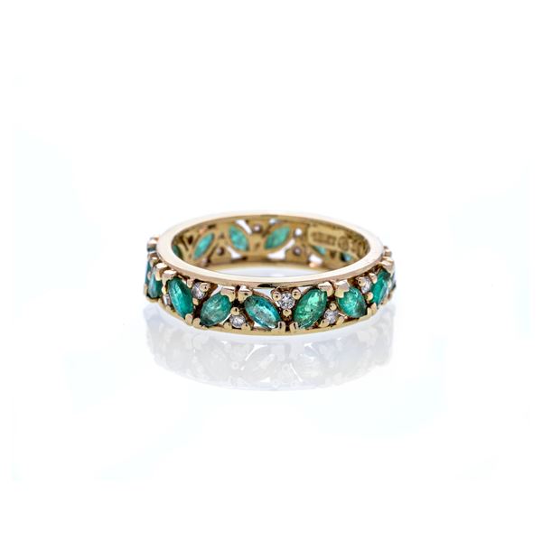 Eternity ring in yellow gold, diamonds and emeralds