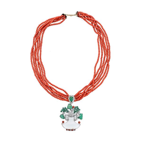 Gold and coral necklace with flower vase pendant in rock crystal, diamonds and emeralds