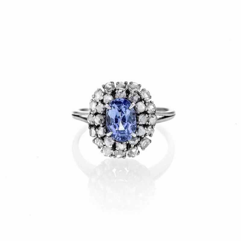 Anello a margherita in platino, diamanti e zaffiro naturale