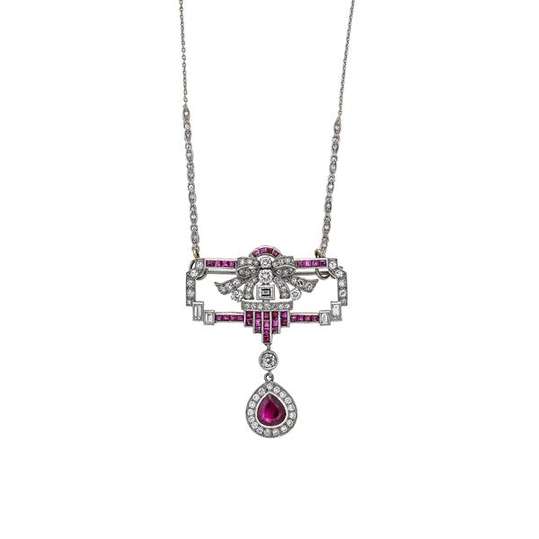 Pendant brooch in platinum, 18 kt white gold, rubies and diamonds with white gold and diamond chain