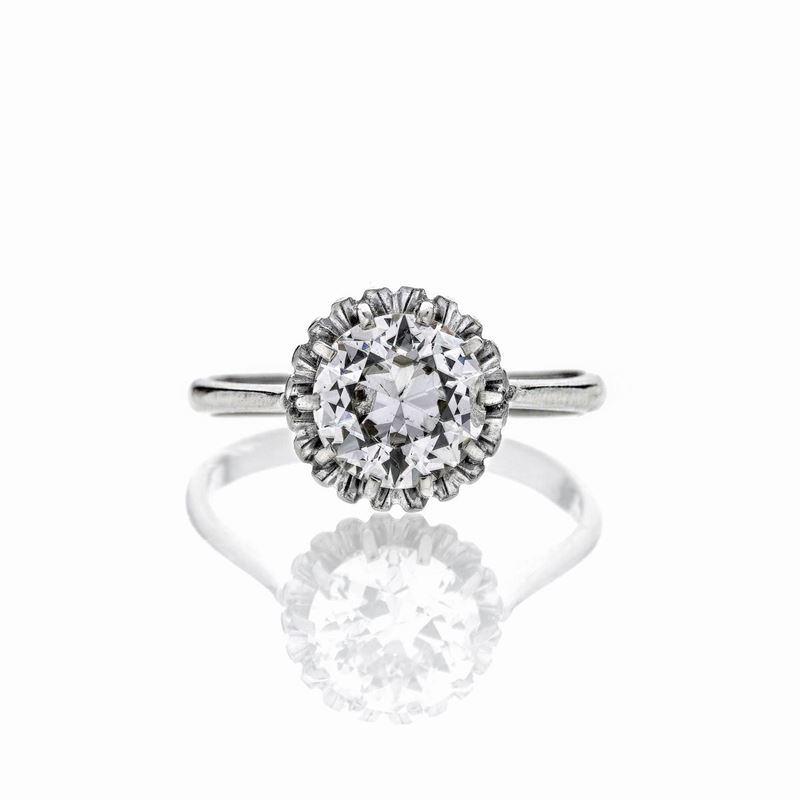 Anello solitario in oro bianco e diamante