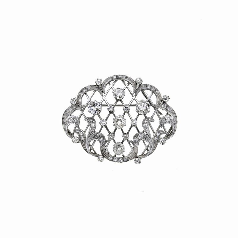Spilla fantasia in oro bianco 18 kt e diamanti