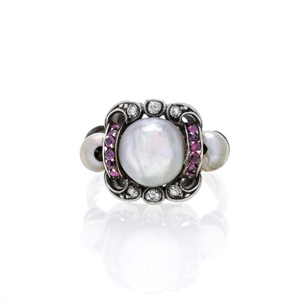 Ring in white gold, diamonds, rubies and pearls