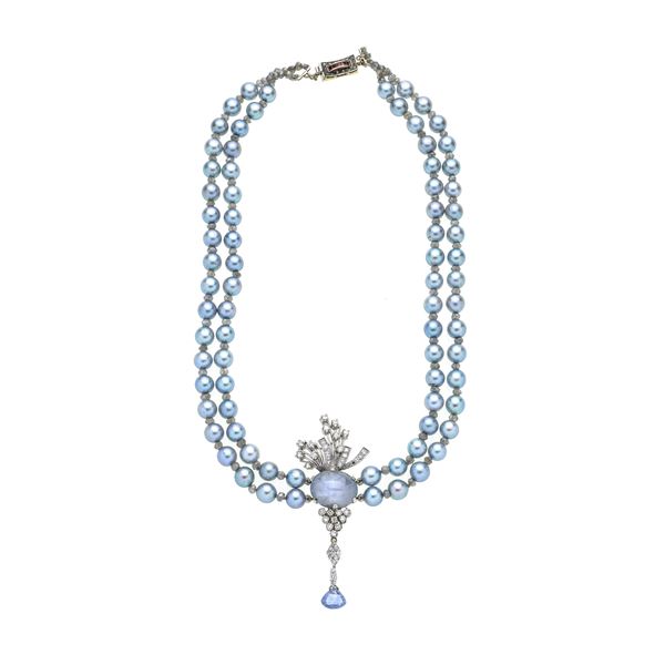 Two-strand necklace in gray pearls, white gold, labradorite, diamonds and star sapphire