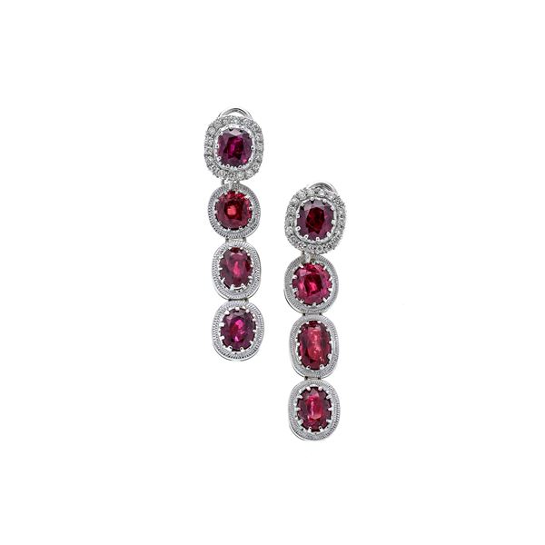 Pair of pendant earrings in white gold, diamonds and rubies