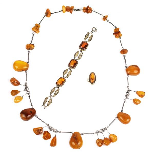 Long necklace in silver and amber, bracelet and ring in 9 kt gold and amber