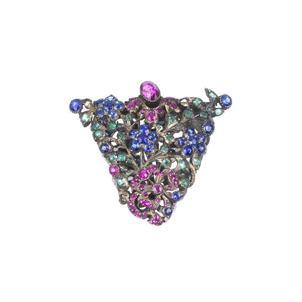 Large silver clip, sapphires, rubies and emeralds