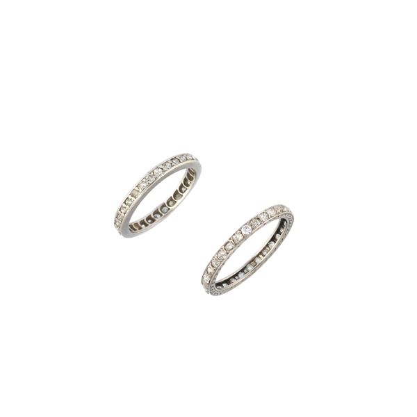Eternity ring in white gold and diamonds and another similar one both in 18 kt gold