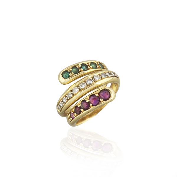 Contrariè triple band ring in 18 kt yellow gold, diamonds, rubies and emeralds