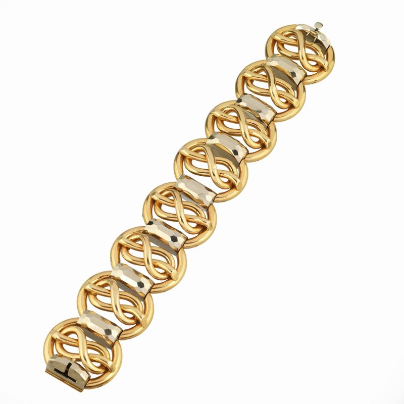 Alto bracciale a maglie in oro giallo e bianco 18 kt