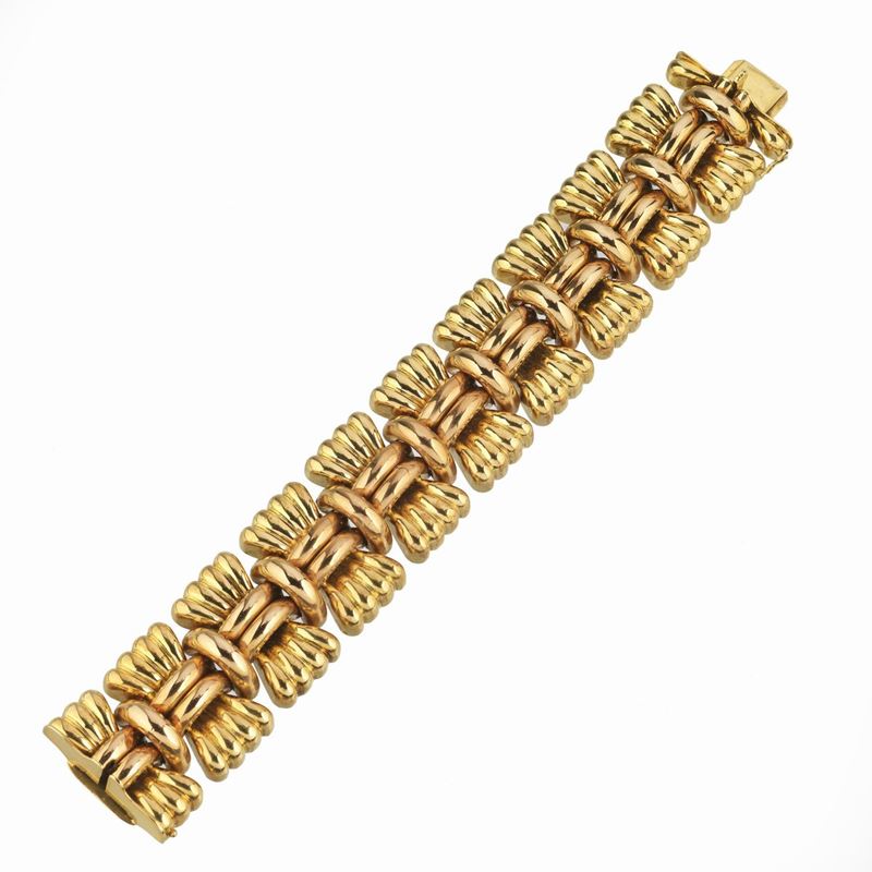 Alto bracciale in oro giallo e oro rosa 18 kt