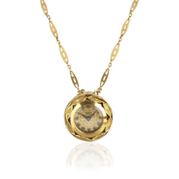 18kt yellow gold pendant watch with long 9kt yellow gold chain