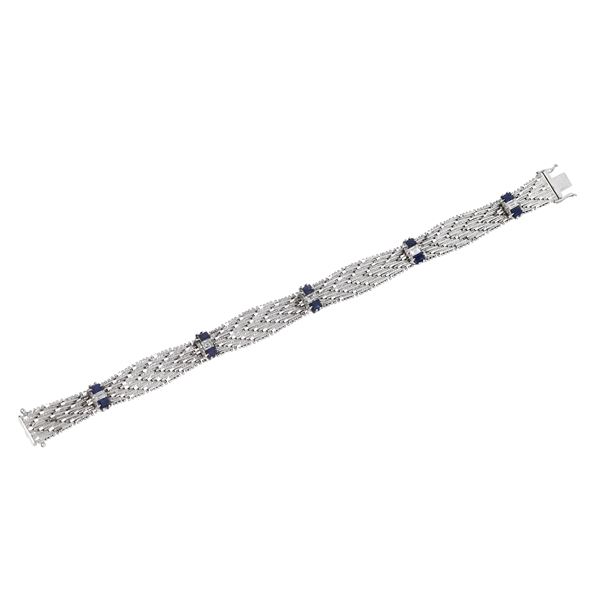 Woven mesh bracelet in 18 kt white gold, diamonds and sapphires
