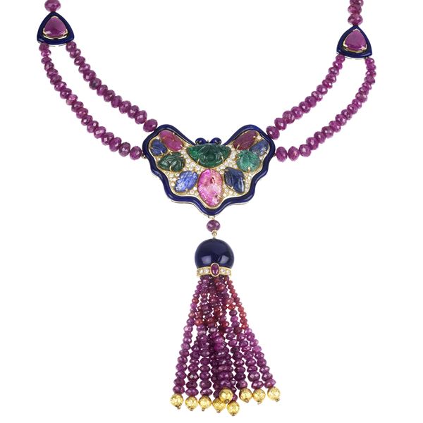 Long necklace in 18 kt yellow gold, diamonds, blue enamel, rubies, emeralds and sapphires
