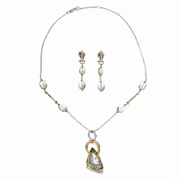 Parure in oro bianco e oro giallo 18 kt, diamanti e acquamarina  - Asta Asta di  Gioielli Antichi, Moderni,  Orologi da Polso e Gioielli da una Collezione Romana - Curio - Casa d'aste in Firenze