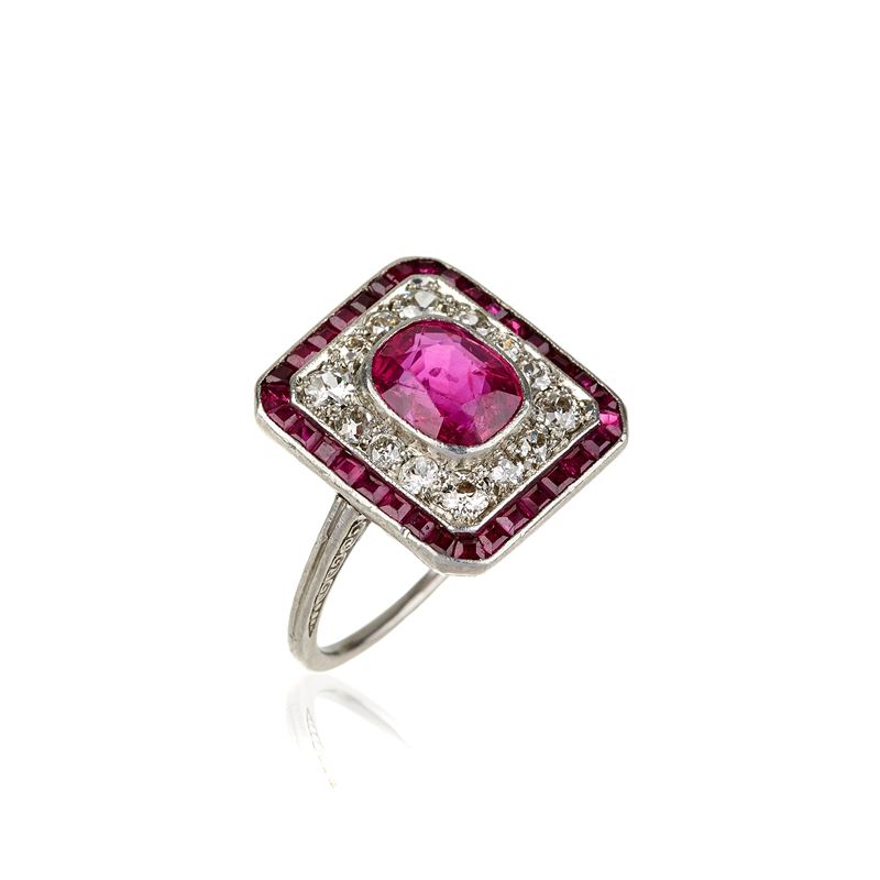 Anello in oro bianco 18 kt, diamanti e rubini Birmani Naturali