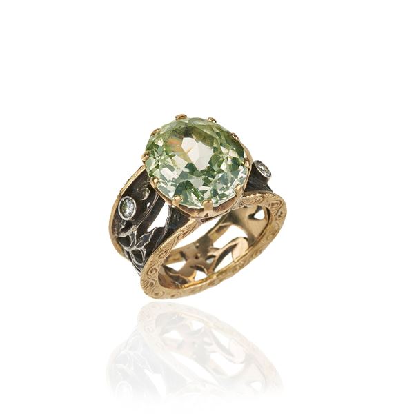 Band ring in 18 kt yellow gold, silver, diamonds and green synthetic spinel