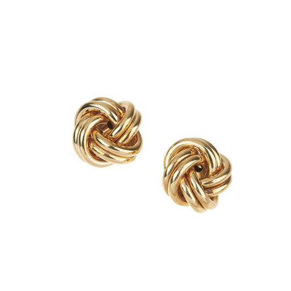 Pair of knot earrings in 18 kt yellow gold