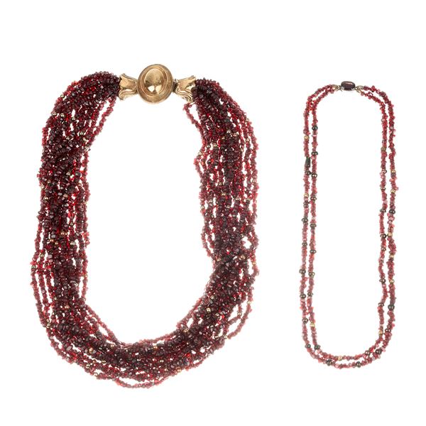 Torchon necklace in gilded silver and garnet and another with two strands, silver and garnet