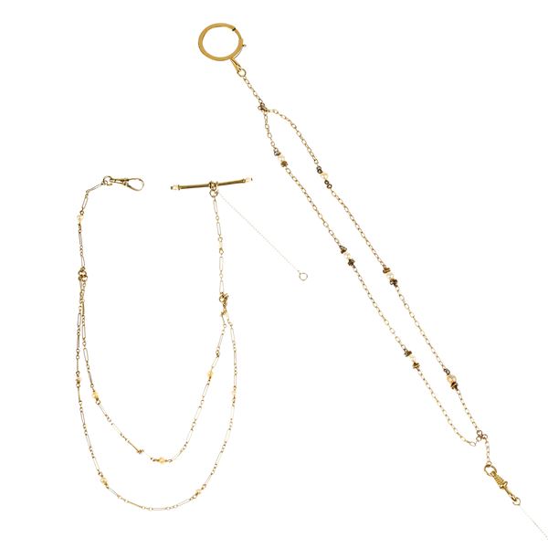 Two intertwined link watch chains in 18 kt gold and micropearls