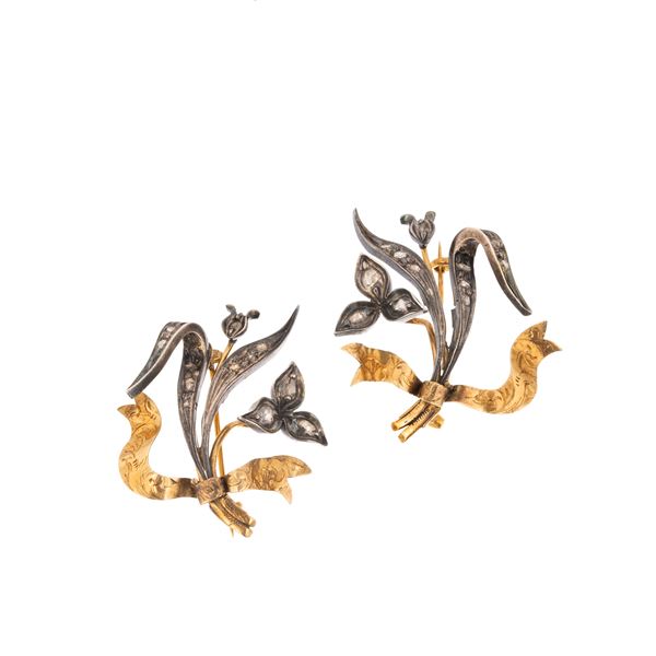 Pair of floral brooches in yellow gold, silver and diamonds and pair of earrings in 12 kt gold and pearl