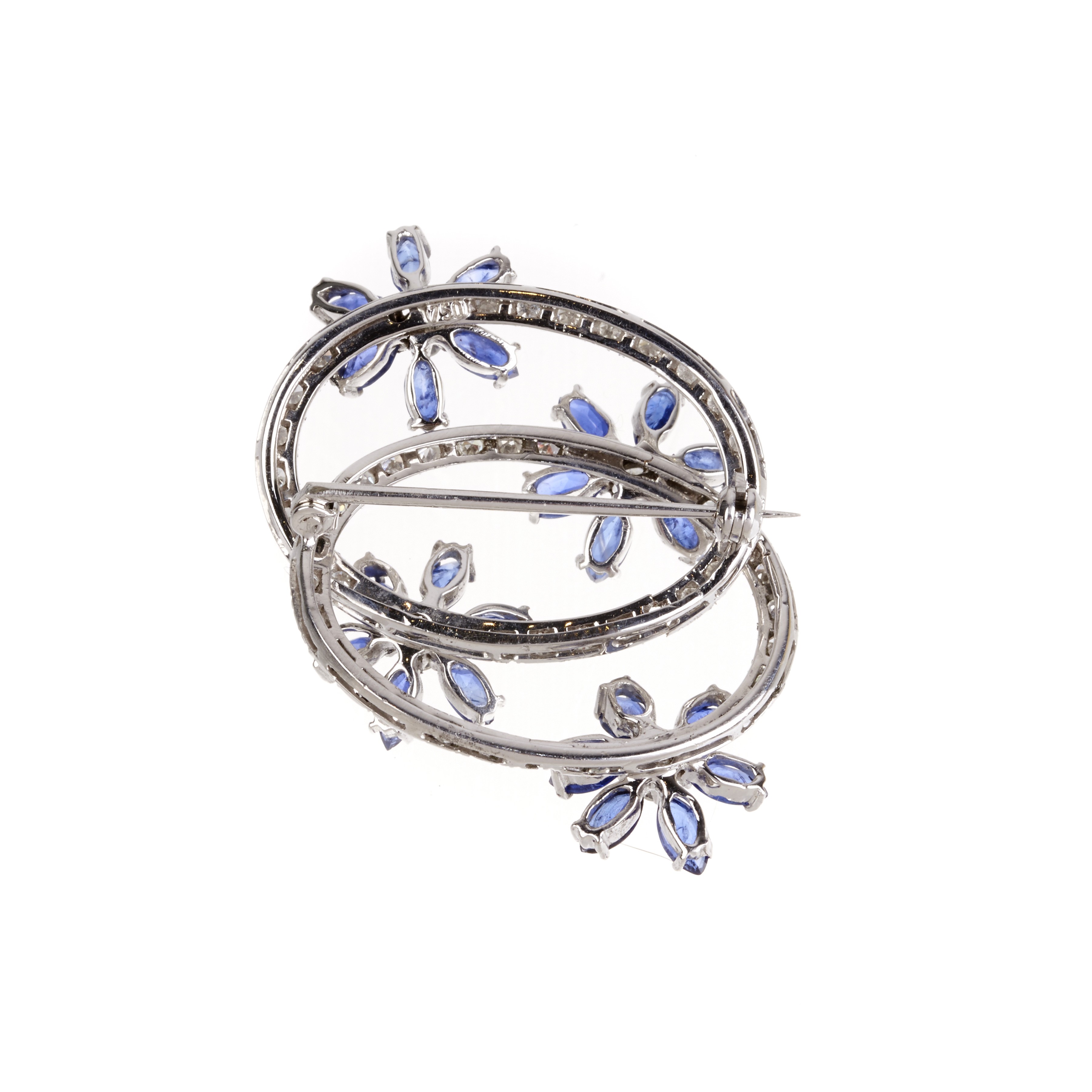Spilla floreale in oro bianco 18 kt, diamanti e zaffiri