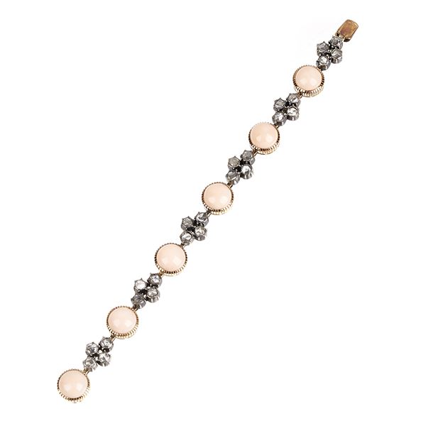Bracelet in 18 kt rose gold, silver, diamonds and pink coral
