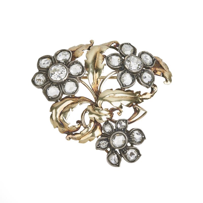 Spilla floreale in oro giallo 14 kt, argento e diamanti