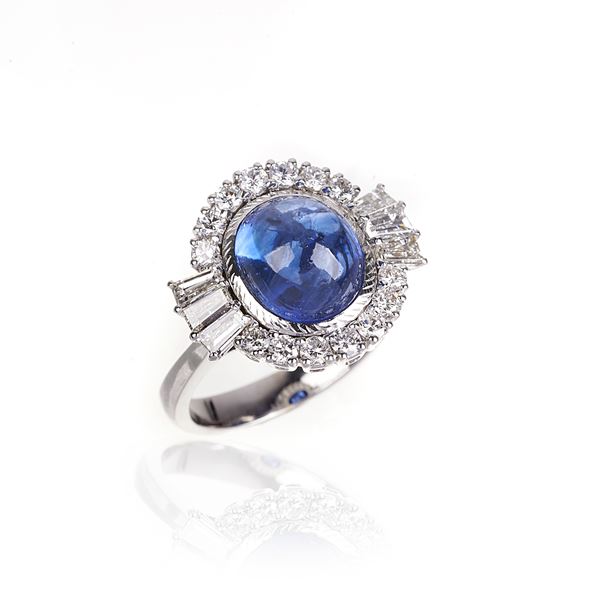Ring in 18 kt white gold, diamonds and sapphire