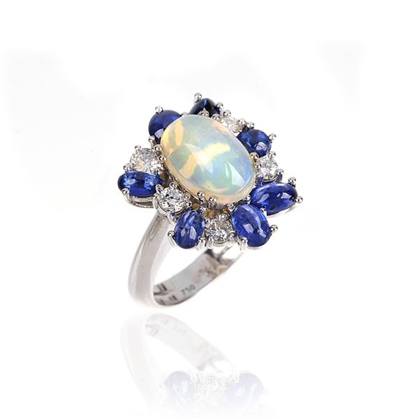 Anello in oro bianco 18 kt diamanti, zaffiri e opale