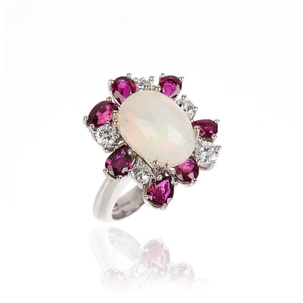 Ring in 18 kt white gold, diamonds, ruby and opal