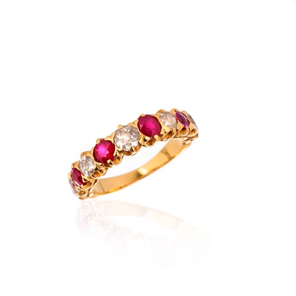 Riviere ring in 18 kt yellow gold, diamonds and rubies