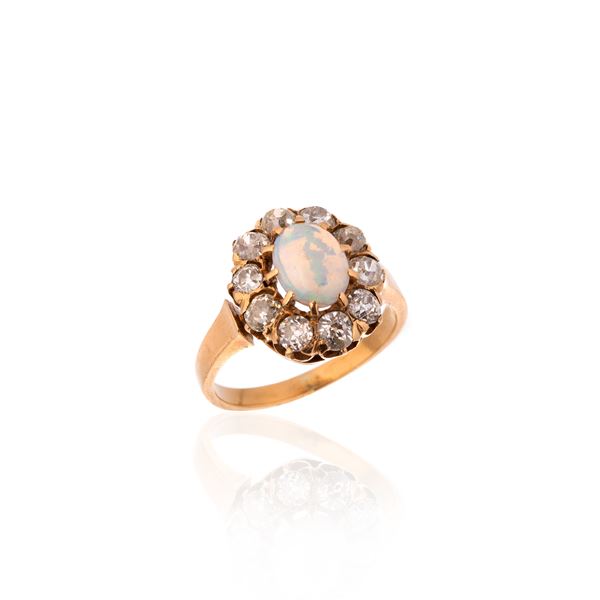 Daisy ring in yellow gold, diamonds and opal