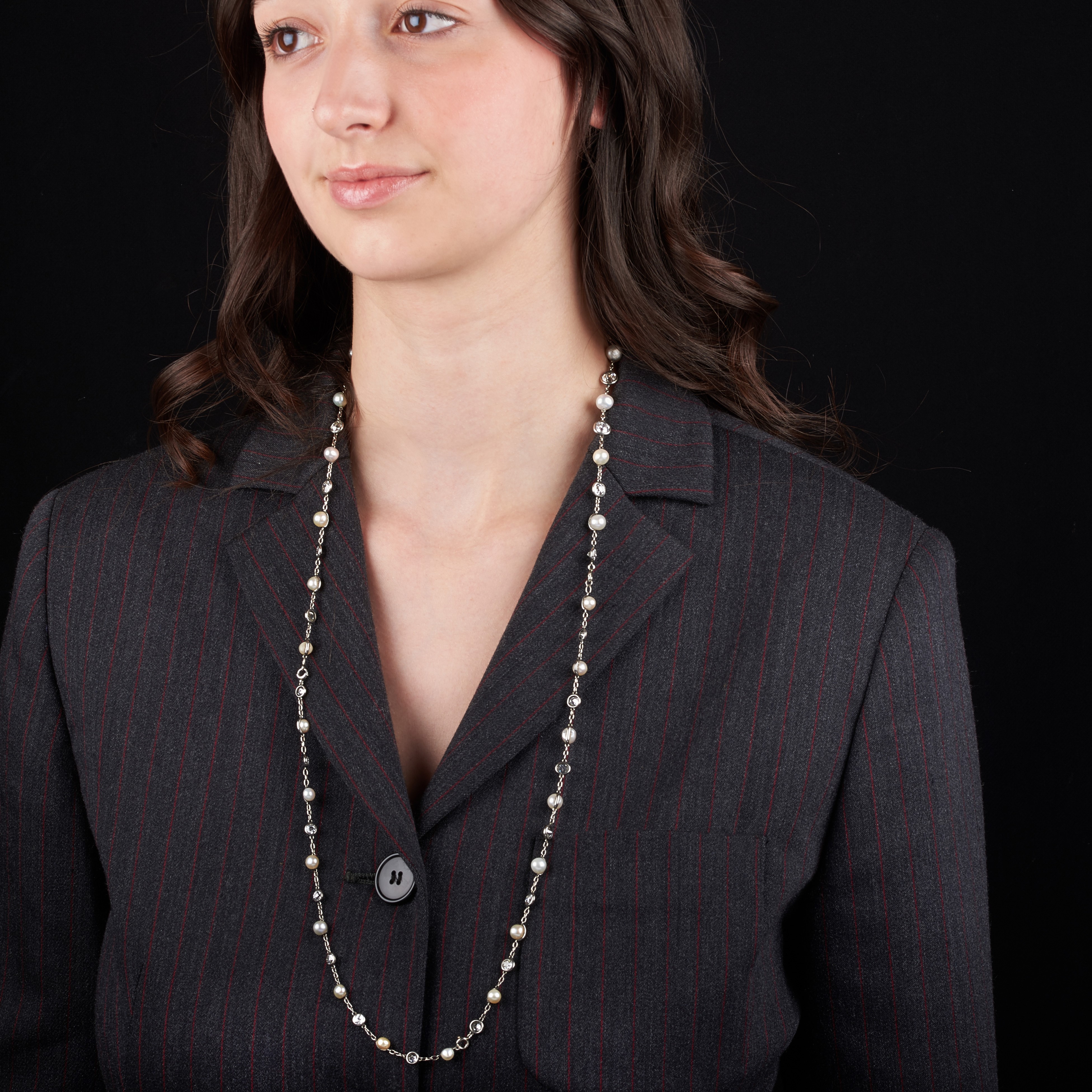 Lunga Collana trasformabile in quattro bracciali in platino, diamanti e perle