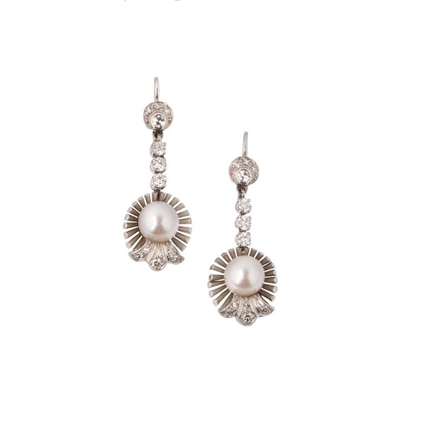 Pair of pendant earrings in white gold, diamonds and cultured pearls