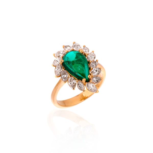 Ring in yellow gold, diamonds and Zambia emerald