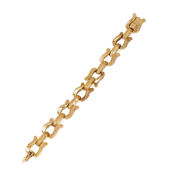 Bracelet with shaped links alternating with engraved 18  kt gold rectangular rounded links