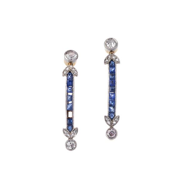 Pair of bar earrings in yellow gold, sapphires and diamonds