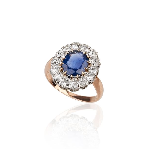 Daisy ring in yellow gold, white gold, diamonds and natural Burmese sapphire