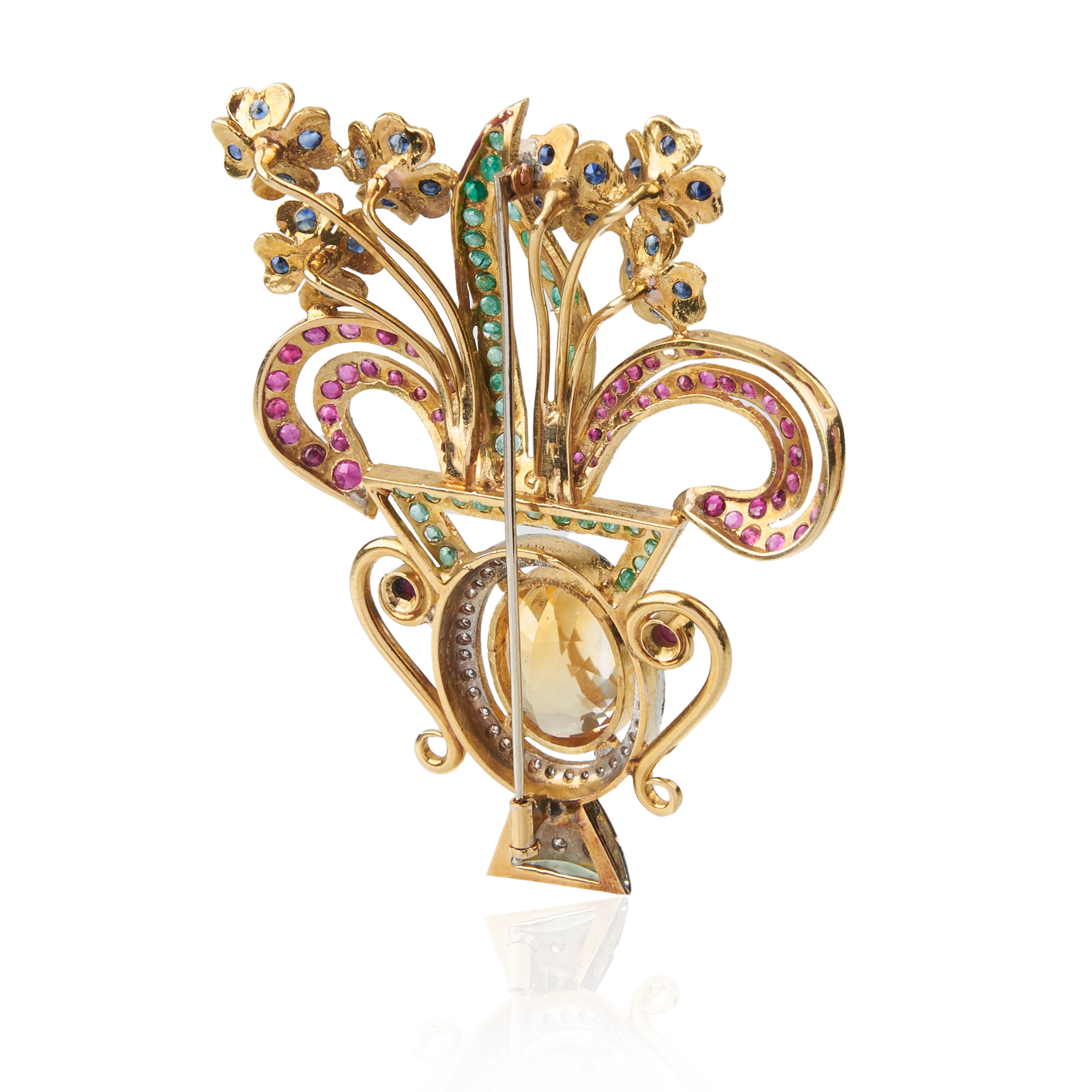 Grande spilla a vaso in oro giallo, quarzo giallo, diamanti, smeraldi e zaffiri