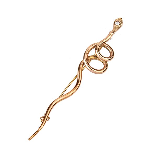 Snake brooch in rose gold and diamond