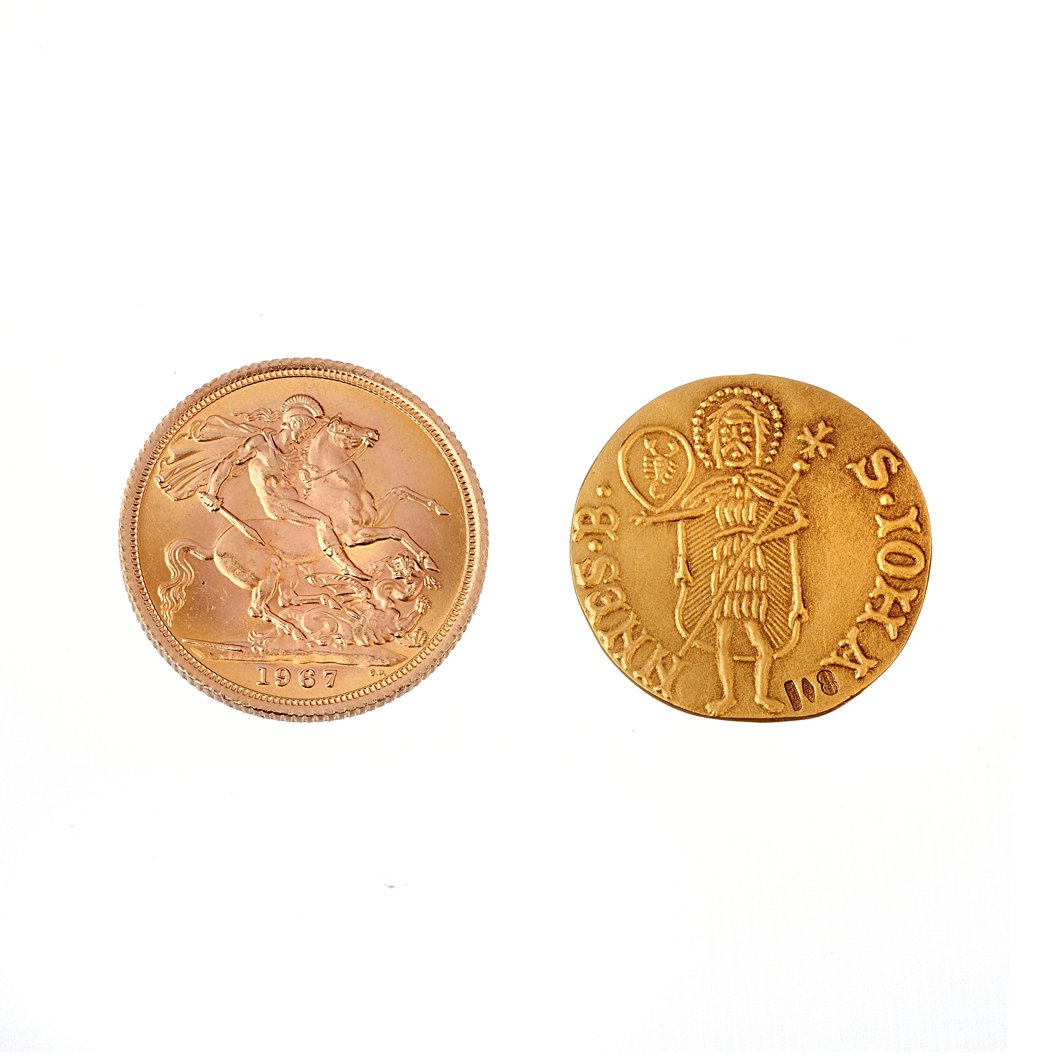 Una sterlina e un'altra moneta in oro 18 kt