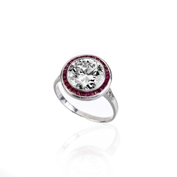 Solitaire ring in 18 kt white gold, diamond and rubies